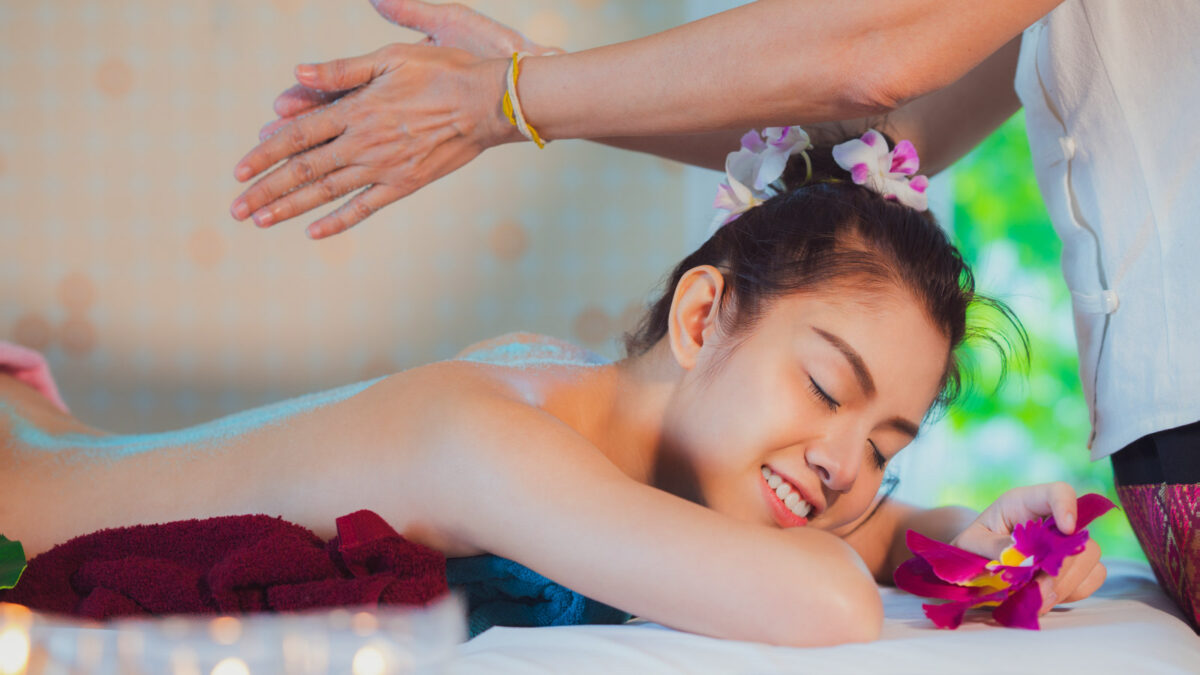 Girl getting relaxing Thai massage